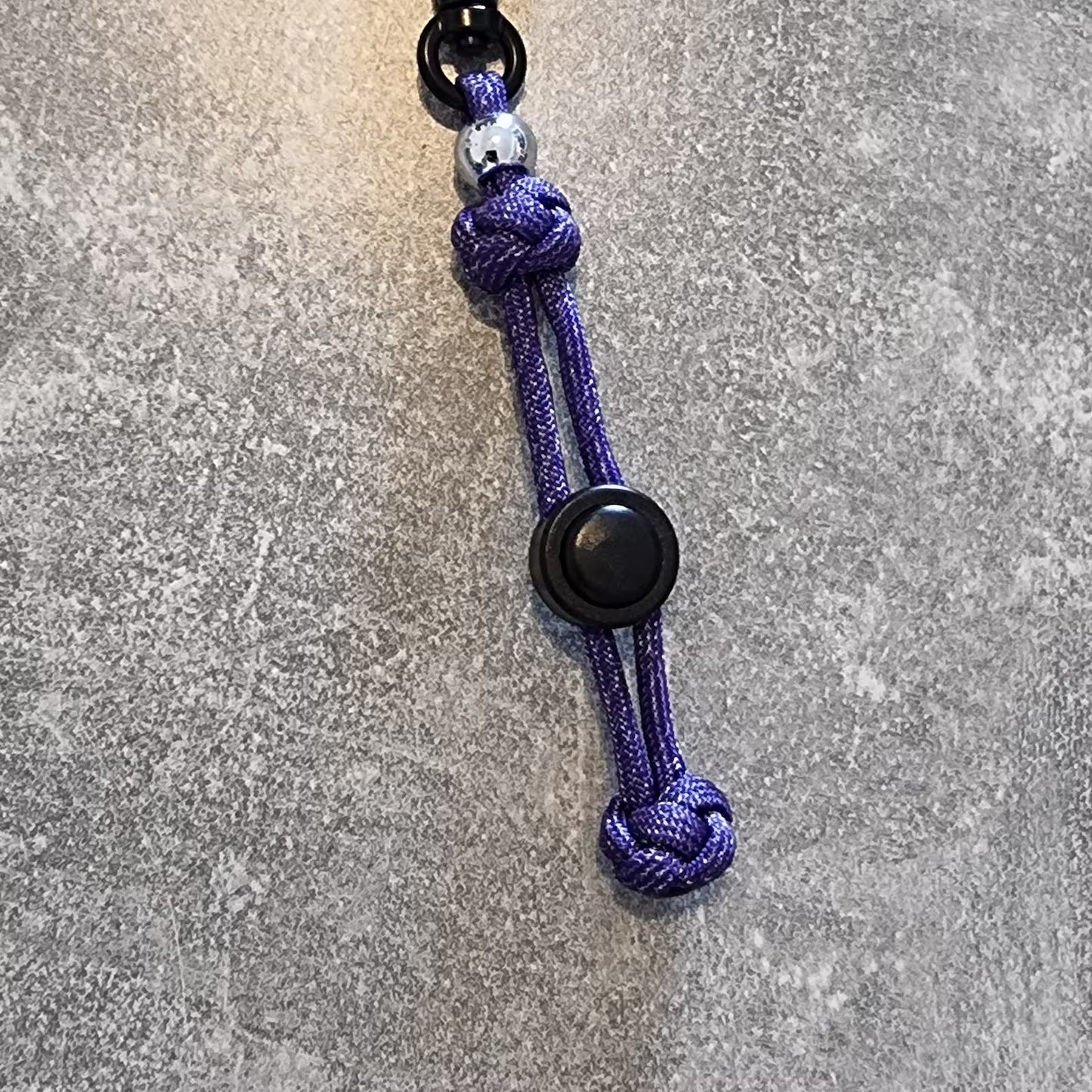 Kotbeutelhalter aus Paracord