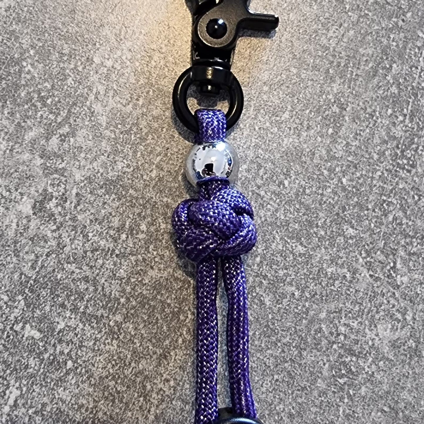 Kotbeutelhalter aus Paracord